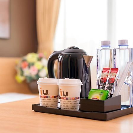 Iu Hotel Zhanjiang Haibin Avenue Xinhaimingchen Экстерьер фото