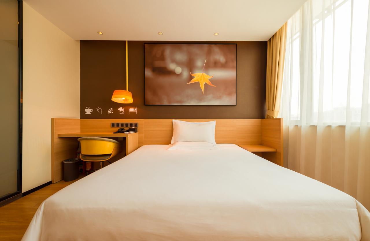 Iu Hotel Zhanjiang Haibin Avenue Xinhaimingchen Экстерьер фото