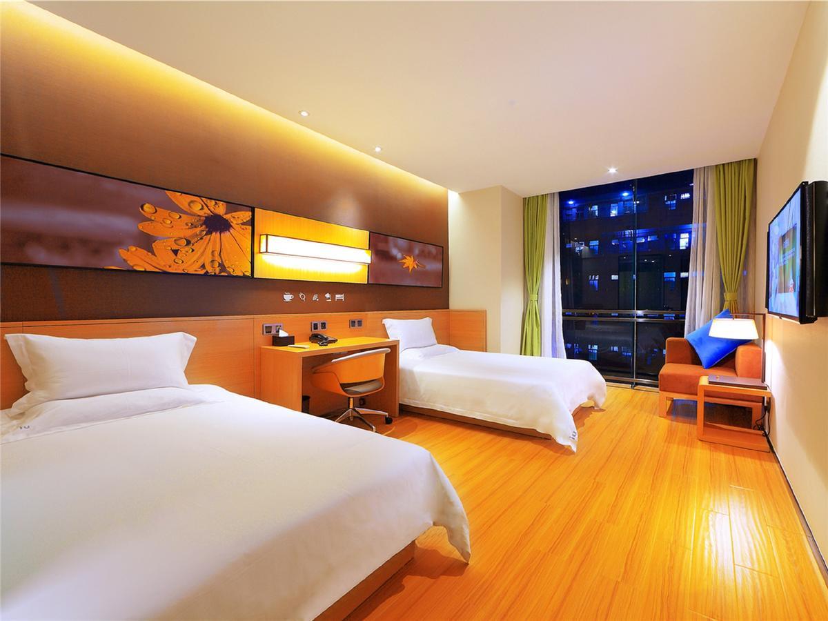 Iu Hotel Zhanjiang Haibin Avenue Xinhaimingchen Экстерьер фото