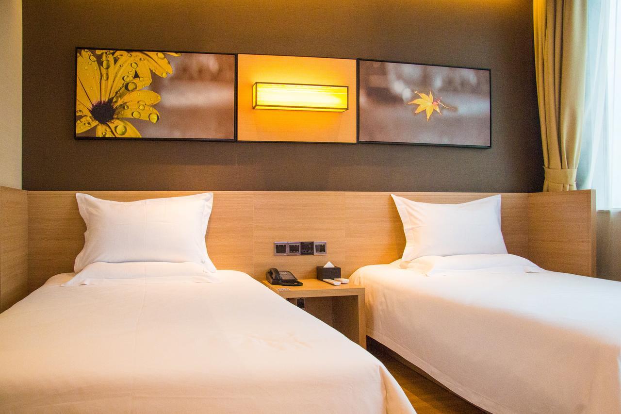 Iu Hotel Zhanjiang Haibin Avenue Xinhaimingchen Экстерьер фото