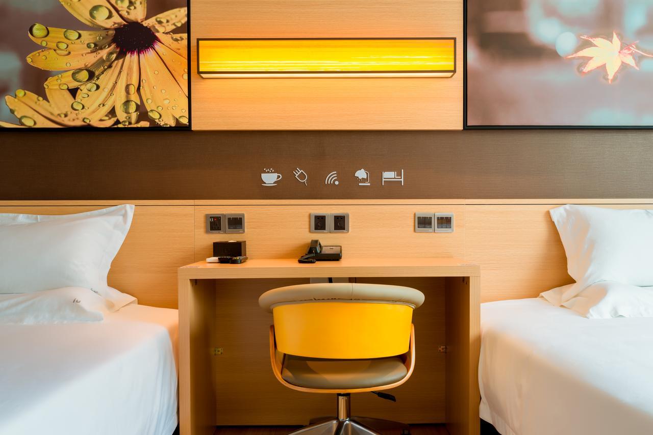 Iu Hotel Zhanjiang Haibin Avenue Xinhaimingchen Экстерьер фото